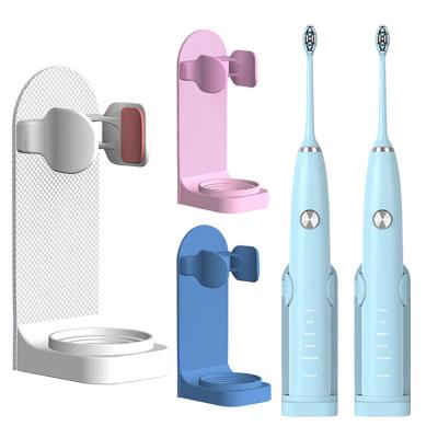 China Base Viable Adjustable Silicone Electric Toothbrush Holder Wall Mount Toothbrush Holder Non-Slip Brush Body Holder Fit 99% for sale