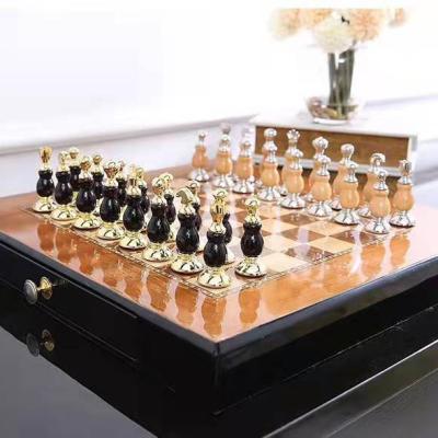 China Custom china foldab lestandard chess metal or wooden board set jigsaw chess pieces board game teaching international chess for sale