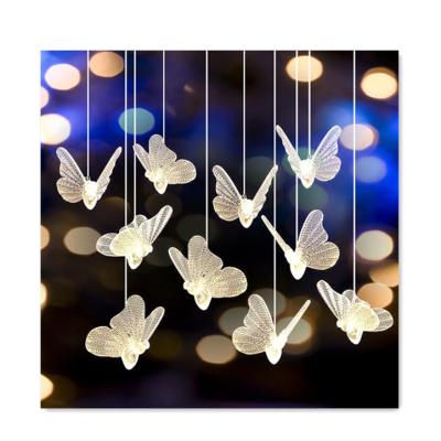 China Creative Durable Wedding Acrylic 10 Strings Props Chandelier Acrylic Butterfly Chandelier Stars Sky Ceiling Decoration for sale