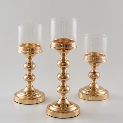 China Wholesale European Gold Metal Candle Holders Stand Flower Vase Candlestick As Road Ahead Candelabra Centerpiece Wedding Decoration for sale