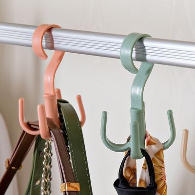 China Multi-Functional Home Wardrobe 4 Claw Hook Link Belt Hanger Rotating Revolving Hanging Hooks for sale