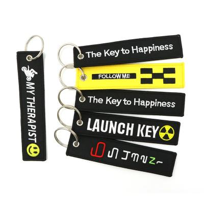 China Promotioanal Gifts / Give Away High Quality Double Sided Customized Embroidered Fabric Key Chain Embroidered Woven Key Chain Brand Key Chain Key Indicator for sale