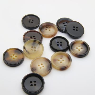 China Round Button Dry Cleaning Sew Roll Shape 4 Holes Polyester Resin Plastic White Black Shirt Button for sale