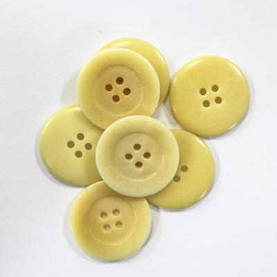 China Custom natural dry cleaning factory price corozo button round eco-friendly dye buttons for sale