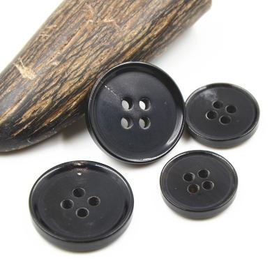 China Customized 4 Holes Real Dry Cleaning Button Buffalo White Black Buffalo Running Horn Button for sale