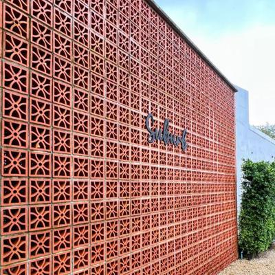 China Artistic Courtyard Exterior Latest Modern Wall Design Clay Hollow Breeze Block Facade Block for sale