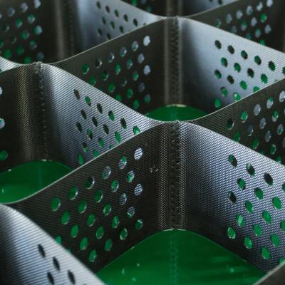 China Textured Perforated Plastic HDPE Honeycombed Geomallas Paved Grid Geocell 445mm for sale