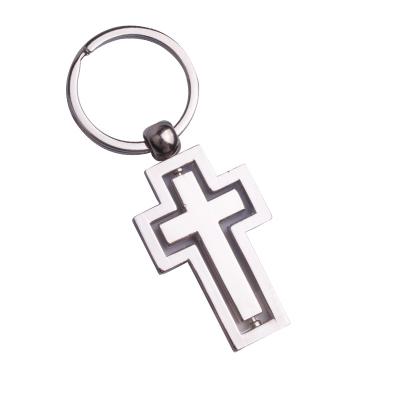 China Metal Popular Creative Cross Key Chain, Hollow 360 Degree Rotating Car Key Chain, Christian Gift Pendant for sale