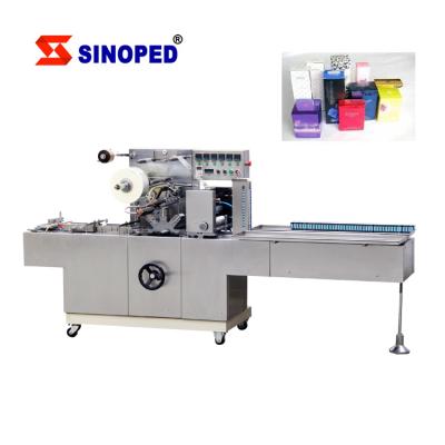 China Stationery full automatic transparent box mask box three-dimensional beverage film packaging machine Te koop