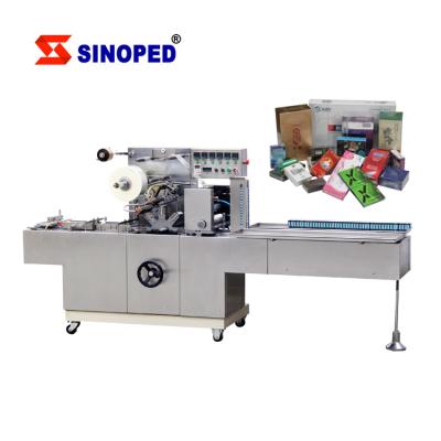 China automatic beverage cellophane box overwrap wrapping machine for box with good price from factory en venta