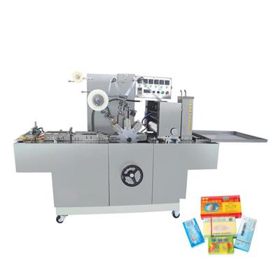 China CLOTHING Cellophane Wrapping Film Machine Suppliers For Poker Box Packaging Equipment for sale