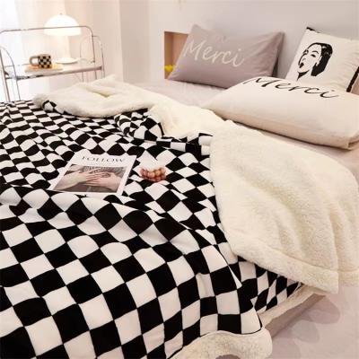 China Newlanston Popular Plaid Black And White Checkerboard Folded Soft Comfortable Claim Thick Blanket For Winter for sale