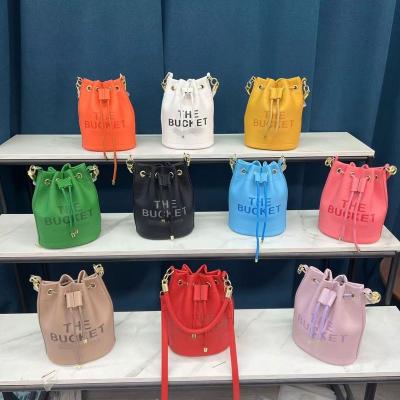 China Bucket shape and stylish printing design Women Hand Bags Luxury Famous Brands Crossbody Leather Bucket Purse Handbag Kids Designer Inspired Purses for sale