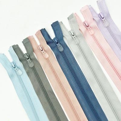 China Wholesale Colorful Auto Lock Cheap Plugged Nylon Zipper For Outdoor Garment Dress Clothing Polo Jump Suit Zipper for sale