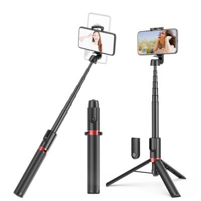 China 360 Rotating Foldable All in One Expandable Multifunctional Selfie Stick 1.3M Phone Tripod Flexible Selfie Stick for sale