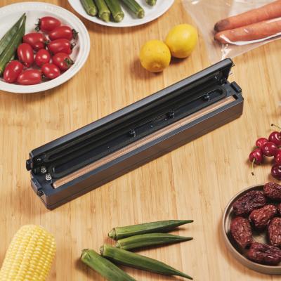 China Hotel Mini Household Film Sealer Packer Sealing Packaging Machine Food Vacuum Sealer for sale