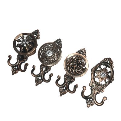 China 2021 Contemporary New European Style Curtain Wall Hook, Zinc Alloy Material, Curtain Fabric Gather Hook for sale