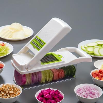 China Household Kitchen Fruit Slicer Vegetable Grater Spiral Drain Basket Onion Line Cutter Vegetable Cleaver for sale