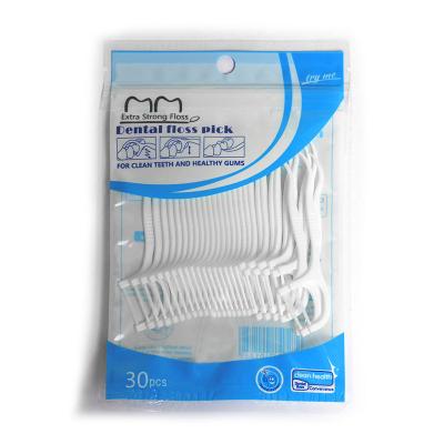 China Teeth Cleaning Pla Dental Floss Pick Easy Slip Interdental Oral Hygiene Product Nylon Holder for sale