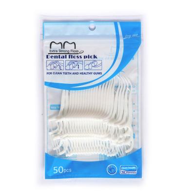 China Teeth Cleaner Mini Oral Gum Care Portable Dental Flosser 50 Pcs Eco Dental Floss Pick Plastic Angled Toothpicks Stick for sale