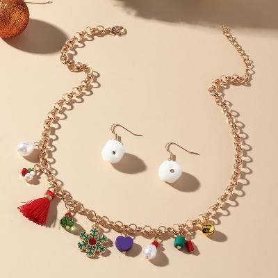 China FASHIONABLE Christmas Tree Snowflake Alloy Christmas Gift Party Necklace Earrings Gold Pendant Jewelry Set for sale