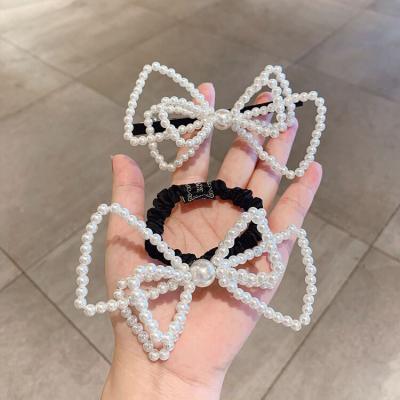 China Korean Newest Design Women's Hair Accessories Double Layer Hollow Hair Decoration Sweet Winter Out Elastic Hair Ring For Girls Pearl Bowknot for sale