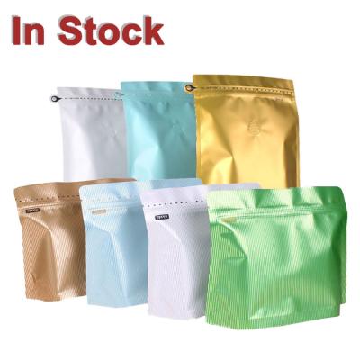 China Moisture proof in stock and custom heavy duty stand up aluminum foil coffee bean packaging pouches bags with degassing valve for sale