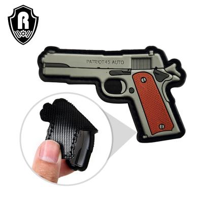 China Custom 3D PVC 3D Camouflage Weapon Gun Patches Hang Holder For Attachment To Tactical Hats And Gear for sale