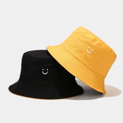 China Eco-Friendly Dye Women Men Spring New Double-Sided Fisherman Hat Men Outdoor Travel Sun Bucket Hat Smiley Face Embroidery Cotton Breathable for sale