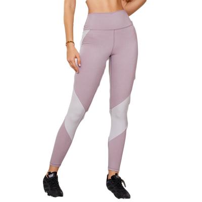 China New Breathable Collision Bare Splicing Color To Lift Buttocks Slimming Fitness Women Yoga Pants Sports Gaiters for sale