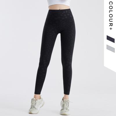 China High waist buttocks new yoga pants breathable naked sexy women running small tight stretch foot fitness pants for sale