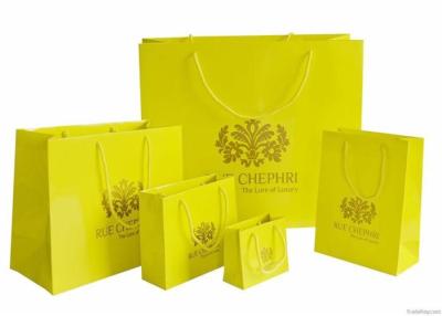 China Large Yellow Printed Paper Bag Recyclable , Gift Bags With Handles For Promotional for sale