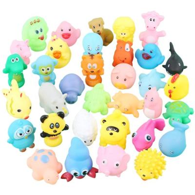 China wet to sound squeezes play 5 -6cm Bath Toy Animals Swimming Water Toys Soft Floating Rubber Duck Mini Squeeze Sound Funny Colorful for sale