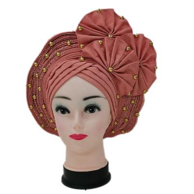 China Latest party good quality sego headtie auto gele headties with beads for sale