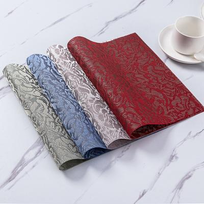 China Sustainable Embroidery Dining Place Mats Durable Multifunctional Weave Placemats Kitchen Table Mats for sale