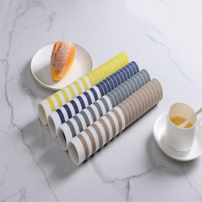 China Home Sustainable Hot Selling Kitchen Table Place Mat Striped Pattern PVC Material Woven Place Mats for sale