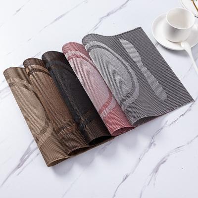 China Viable Protect Table Kitchen Dinner Woven Non-slip Waterproof PVC Rectangle Place Mat Table Mat for sale