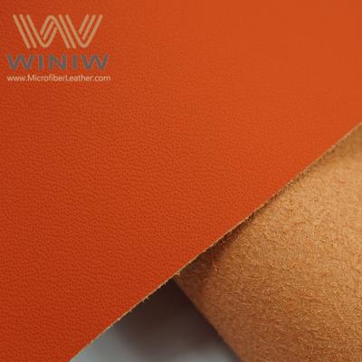 China Waterproof Classic Vinyl Car Upholstery Fabric Eco Leather 1.2mm Orange Orange Black Color for sale