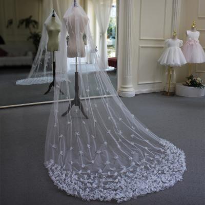 China Soft Luxurious Cut Edge XINMEIJI Cathedral Wedding Veil Tulle Cut A-Layer Applique Long Train White Wedding Veil With Comb V661 for sale