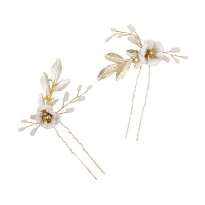 China O559 Ladies Hair Decoration Classic Painted Leaf Ornaments Bridal Double Cathedral Wedding Hair Pins With Faux Flowers for sale