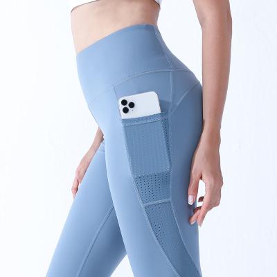 China Wholesale Breathable Yoga Sports Pants Women Wearing Tight Yoga To Use High Waist Lift Hip Fitness Pants Mesh Pocket Workout Gaiters for sale