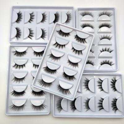 China No animal products used natural fluffy mink eyelashes silk short 5 pair short eyelash collective packaging for sale