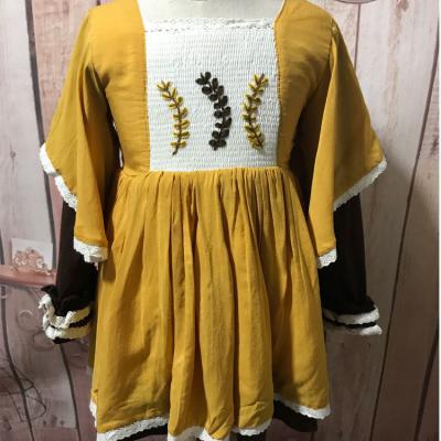 China Sustainable Mustard Viscose Smocked Embroidery Long Sleeve Kids Girls Dresses for sale