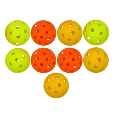 China Durable Factory Price New Outdoor Game Sports Wholesale 26 Holes Outdoor Indoor Pickleball Balls for sale