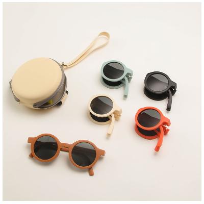 China 2023 Hot Selling Custom Wholesale Toddler Anti UV400 Shading Colorful Matt Round Circle Baby Cute Kids Children Folding Sunglasses for sale