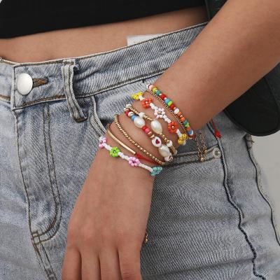 China Hot Sale BOHEMIA Letter Beaded Fruit Heart Happy Face Beads Acrylic Colorful Woven Sunflower Daisy Seed Bead Bracelet Gold Beads Girls for sale