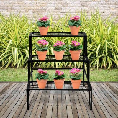 China Simple Creative Multilayer Indoor Wrought Iron Flower Stand Floor Plant Rack for sale