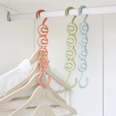 China Behind Doors/On Walls Best Selling Magic Hanger Wall Mount Folding Hanger Holder Hangers To Save Place In Wardrobe for sale