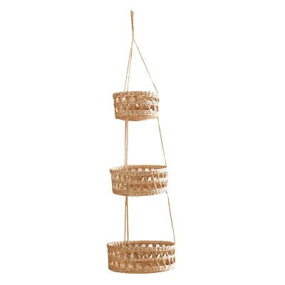 China Sustainable Handmade Natural Plant Plankton Wall 3 Tier Wicker Plant Rack Woven Natural Woven Plant Plankton Modern Boho Home Decor for sale