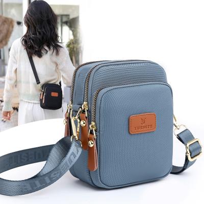 China The diagonal of the 2022 new raincoat women across the trend adjustable raincoat women the soft and removable shoulder bag for sale